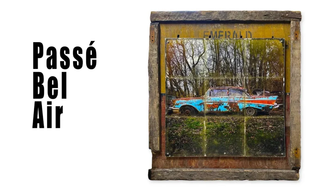 Welcome To Inspiration Avenue Art 1 Fine Art piece called Passe Bel Air of a blue and red antique rusty car mounted on a worn wooden packing crate.